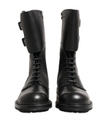 Schwarze Kampfstiefel mit Schnallenriemen aus Leder