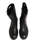 Schwarze Kampfstiefel mit Schnallenriemen aus Leder