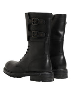 Schwarze Kampfstiefel mit Schnallenriemen aus Leder