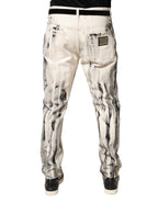 Weiße Used-Look-Jeans mit Farbklecksen