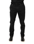 Schwarze, zerfetzte, schmal geschnittene Jeans aus Baumwoll-Denim