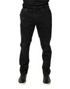Schwarze, zerfetzte, schmal geschnittene Jeans aus Baumwoll-Denim