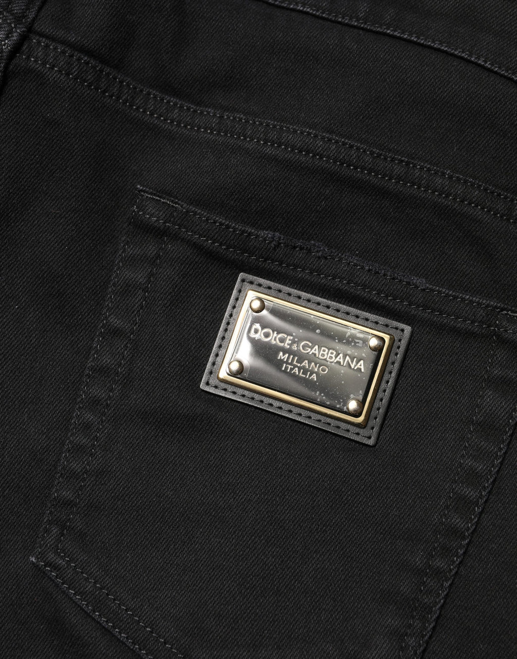 Schwarze, zerfetzte, schmal geschnittene Jeans aus Baumwoll-Denim
