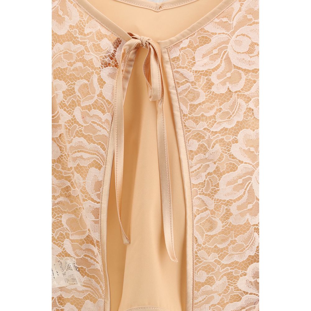 Orangefarbene Seidenbluse