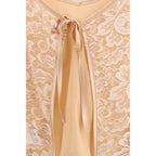 Orangefarbene Seidenbluse