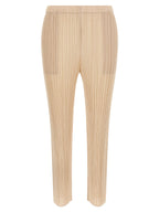 PLEATS PLEASE ISSEY MIYAKE Beige Polyester Casual Pants