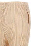 PLEATS PLEASE ISSEY MIYAKE Beige Polyester Casual Pants