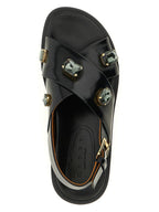 Schwarze flache Sandalen aus Lammleder