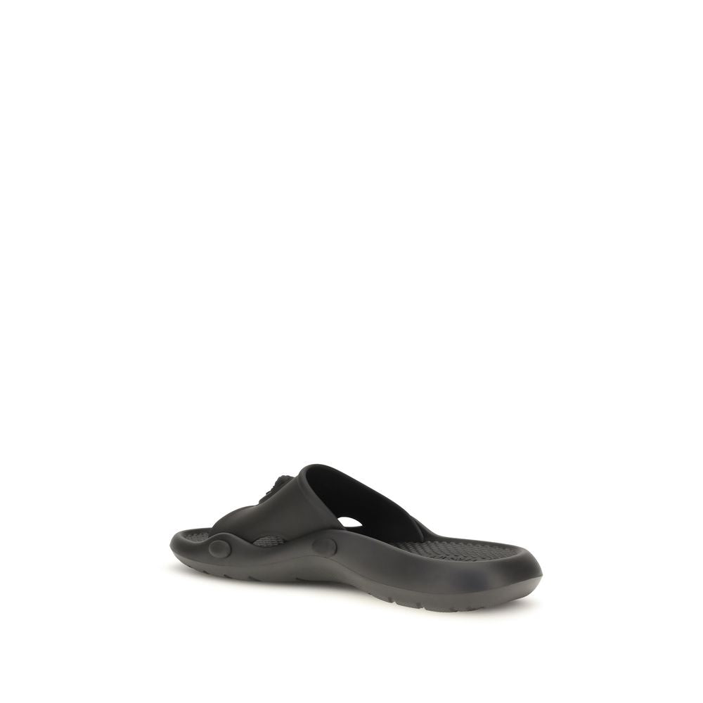 Schwarze Gummi-Sandalen