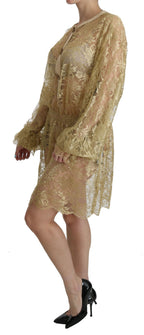 Abito al ginocchio con linea ad A trasparente in pizzo dorato