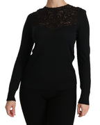 Schwarze Seidenbluse mit Rundhalsausschnitt und langen Ärmeln aus Spitze