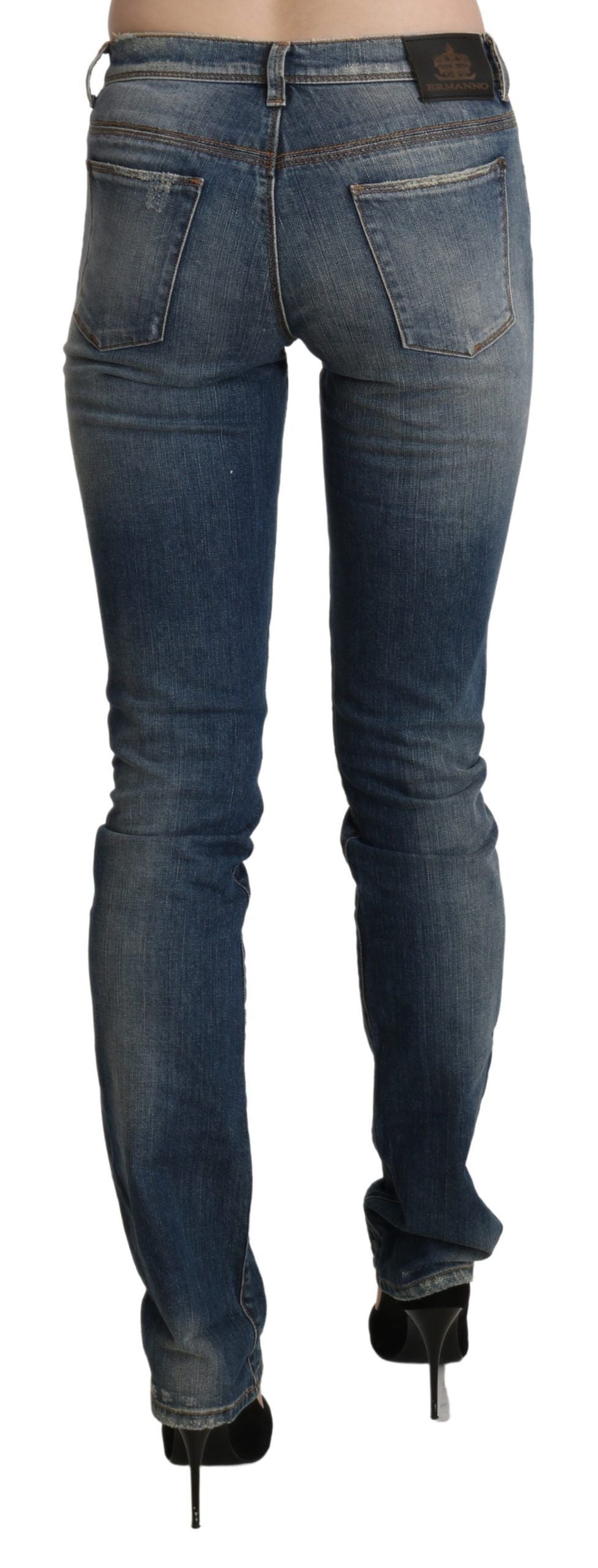 Blaue gewaschene Skinny-Jeans mit mittlerer Bundhöhe