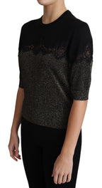 Schwarzes glänzendes Lurex-Pullover-Oberteil mit Spitzeneinsatz