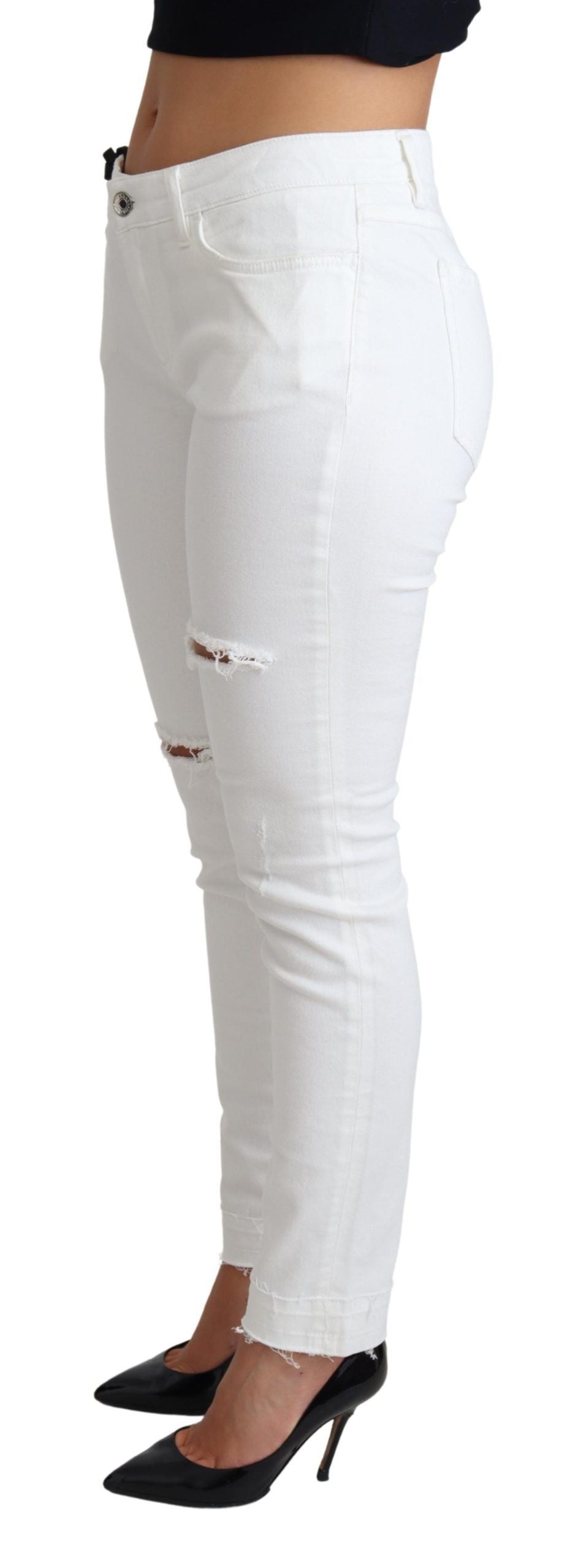 Jeans attillati in denim di cotone elasticizzato bianchi e strappati