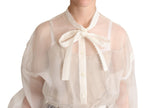 Weiße Bluse mit Ascotkragen und langen Ärmeln
