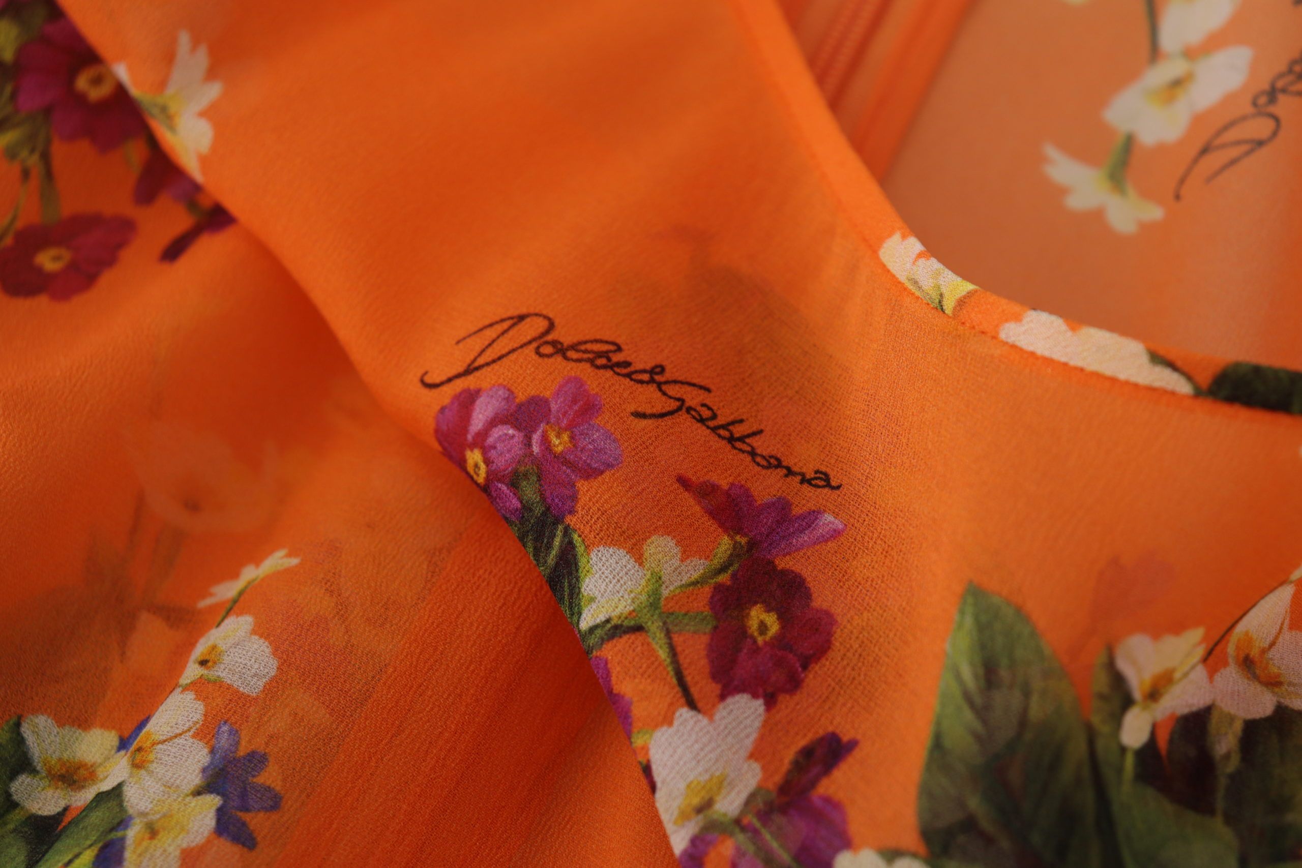 Orange Bluse mit langen Ärmeln und Blumenmuster