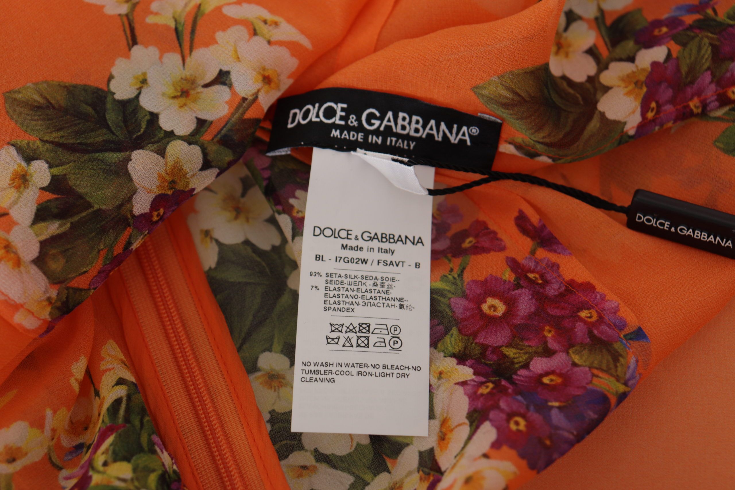 Orange Bluse mit langen Ärmeln und Blumenmuster