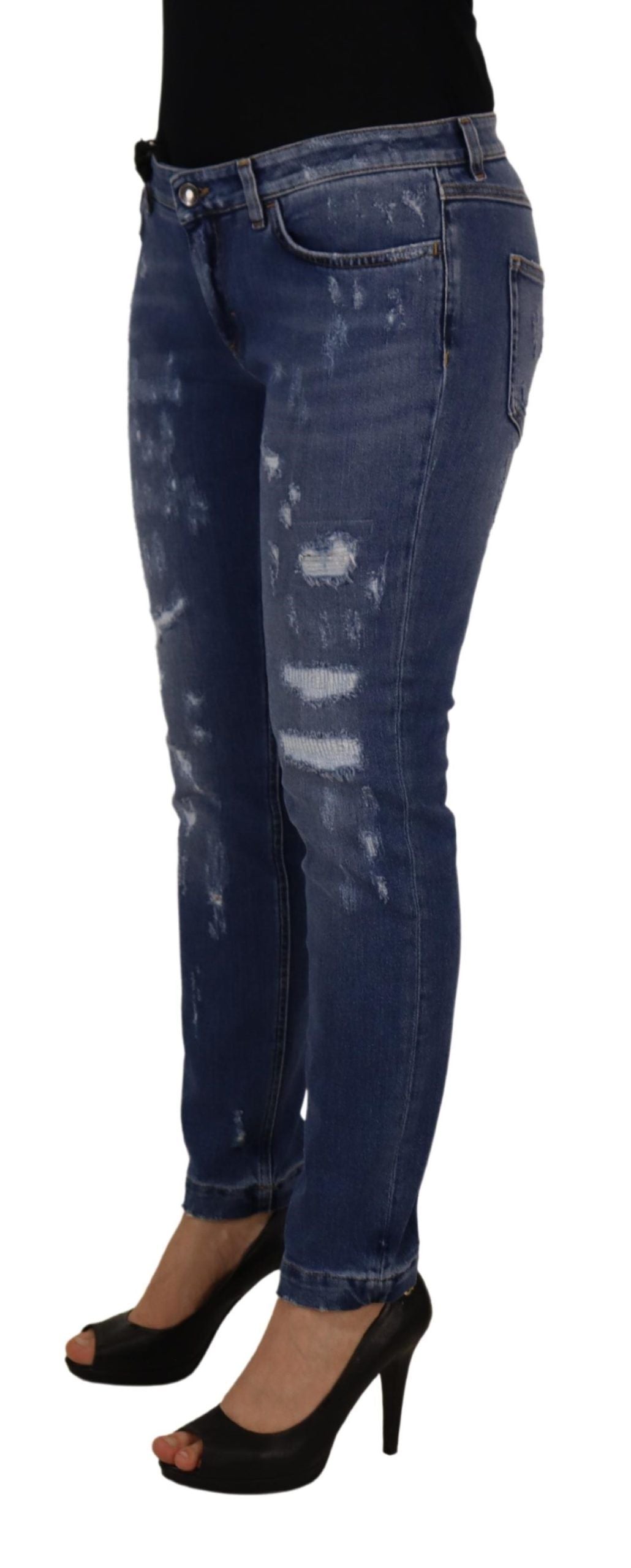 Jeans in denim di cotone délavé blu a vita bassa e gamba aderente
