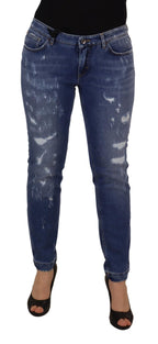 Jeans in denim di cotone délavé blu a vita bassa e gamba aderente