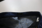 Jeans in denim di cotone délavé blu a vita bassa e gamba aderente
