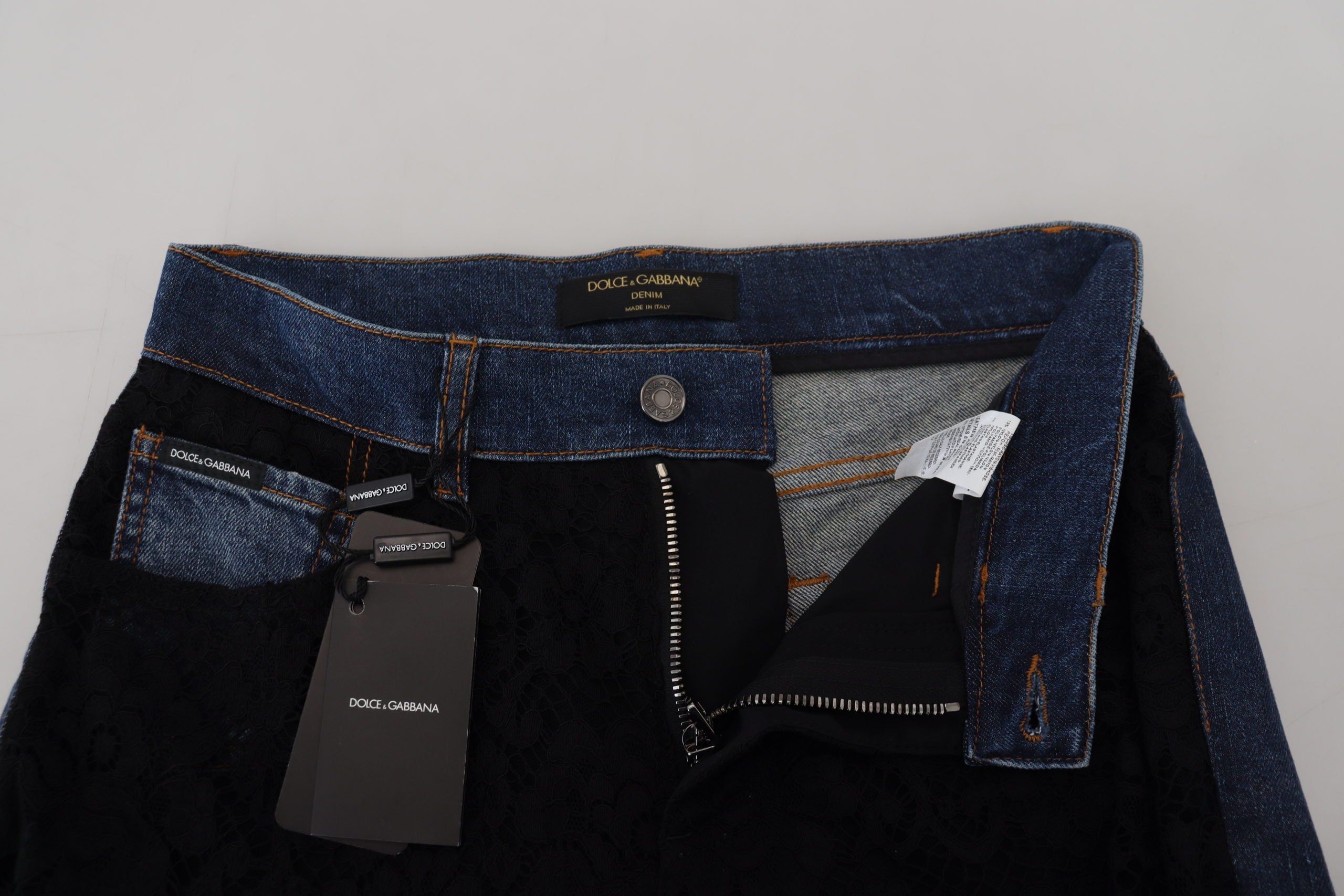 Schwarze Skinny-Jeans mit floraler Spitze vorne