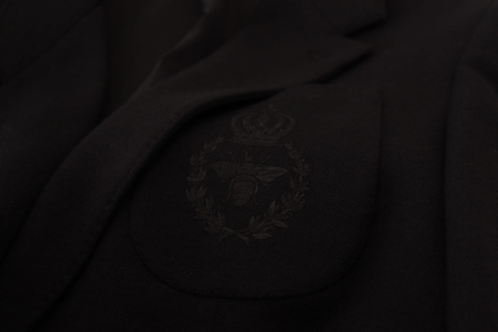 Schwarzer Blazer aus Wolle mit schmaler Passform und Krone