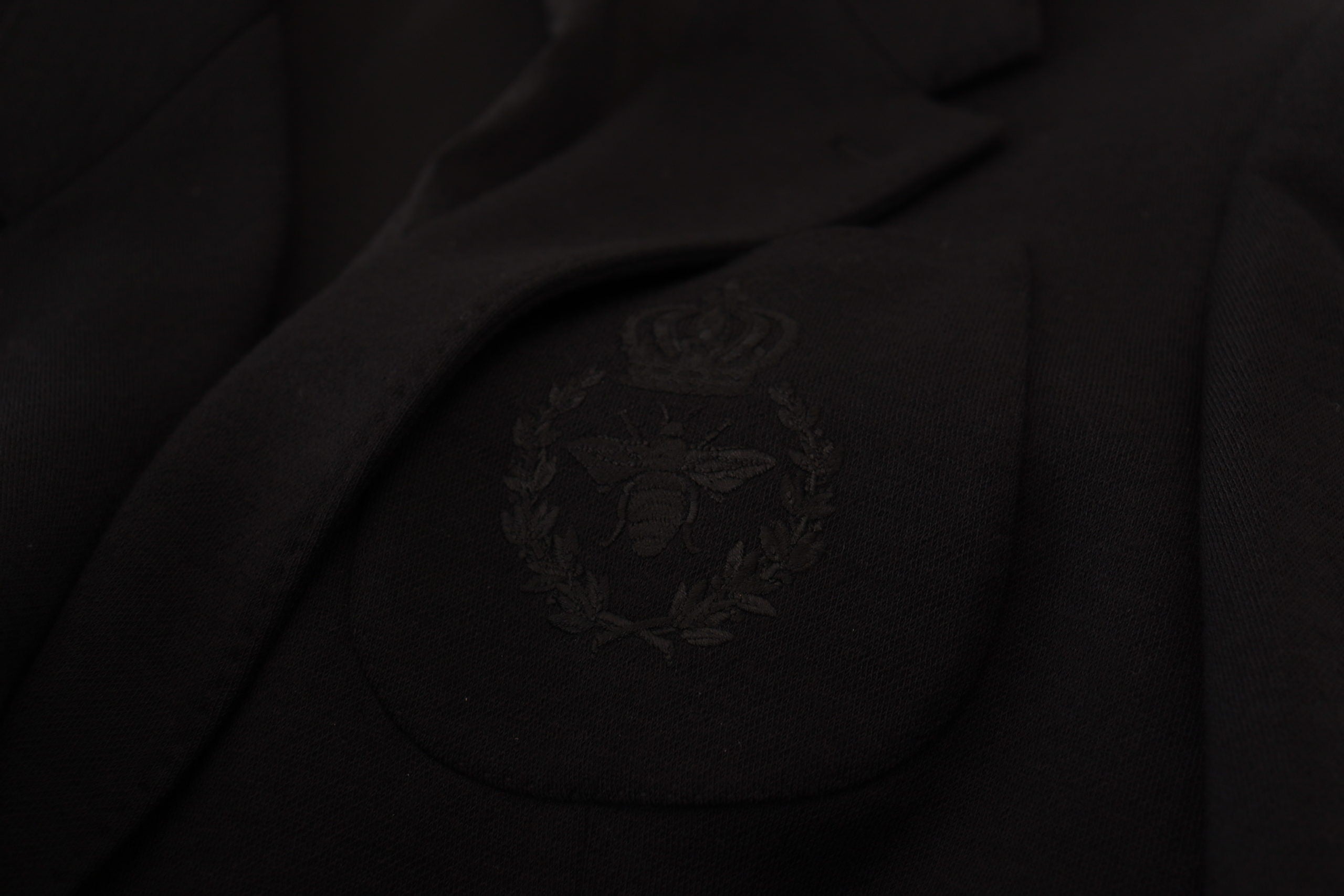 Schwarzer Blazer aus Wolle mit schmaler Passform und Krone