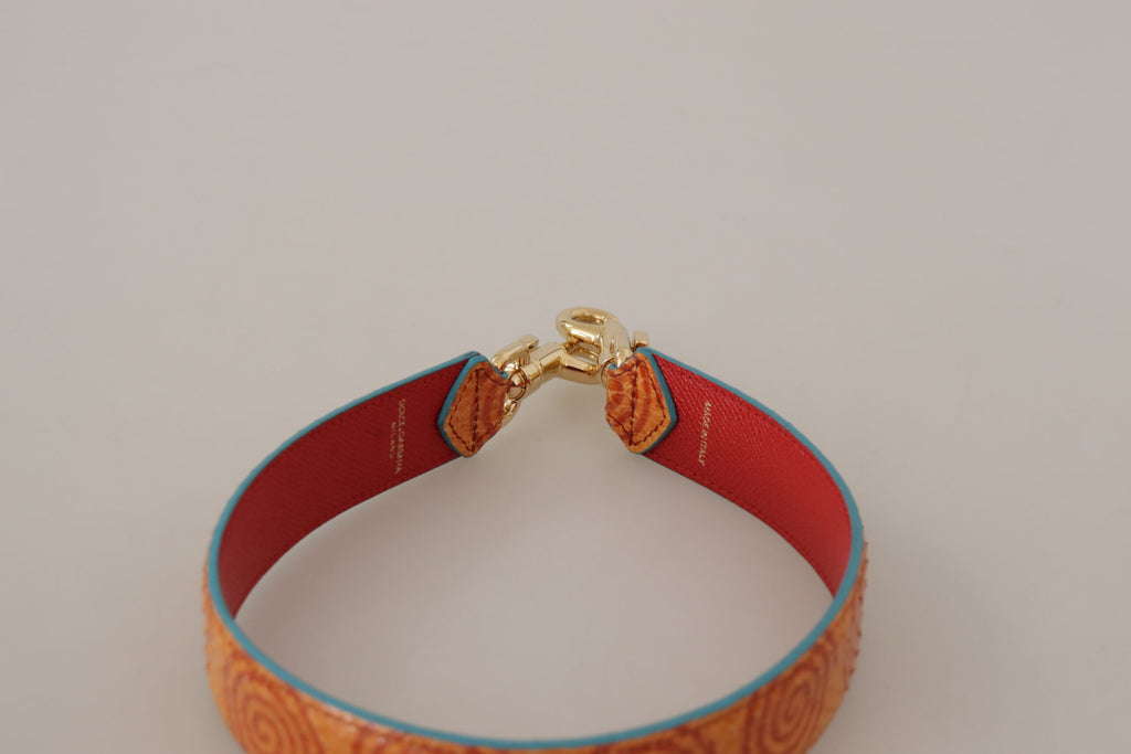 Orange Ledertasche mit Wirbelmuster Schultergurt