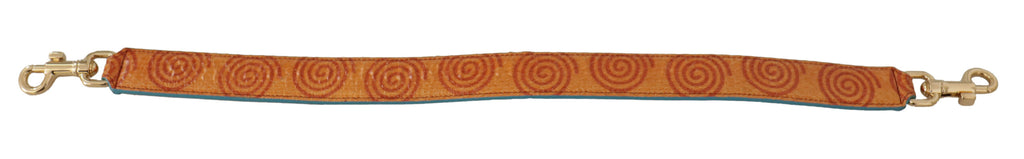Orange Ledertasche mit Wirbelmuster Schultergurt