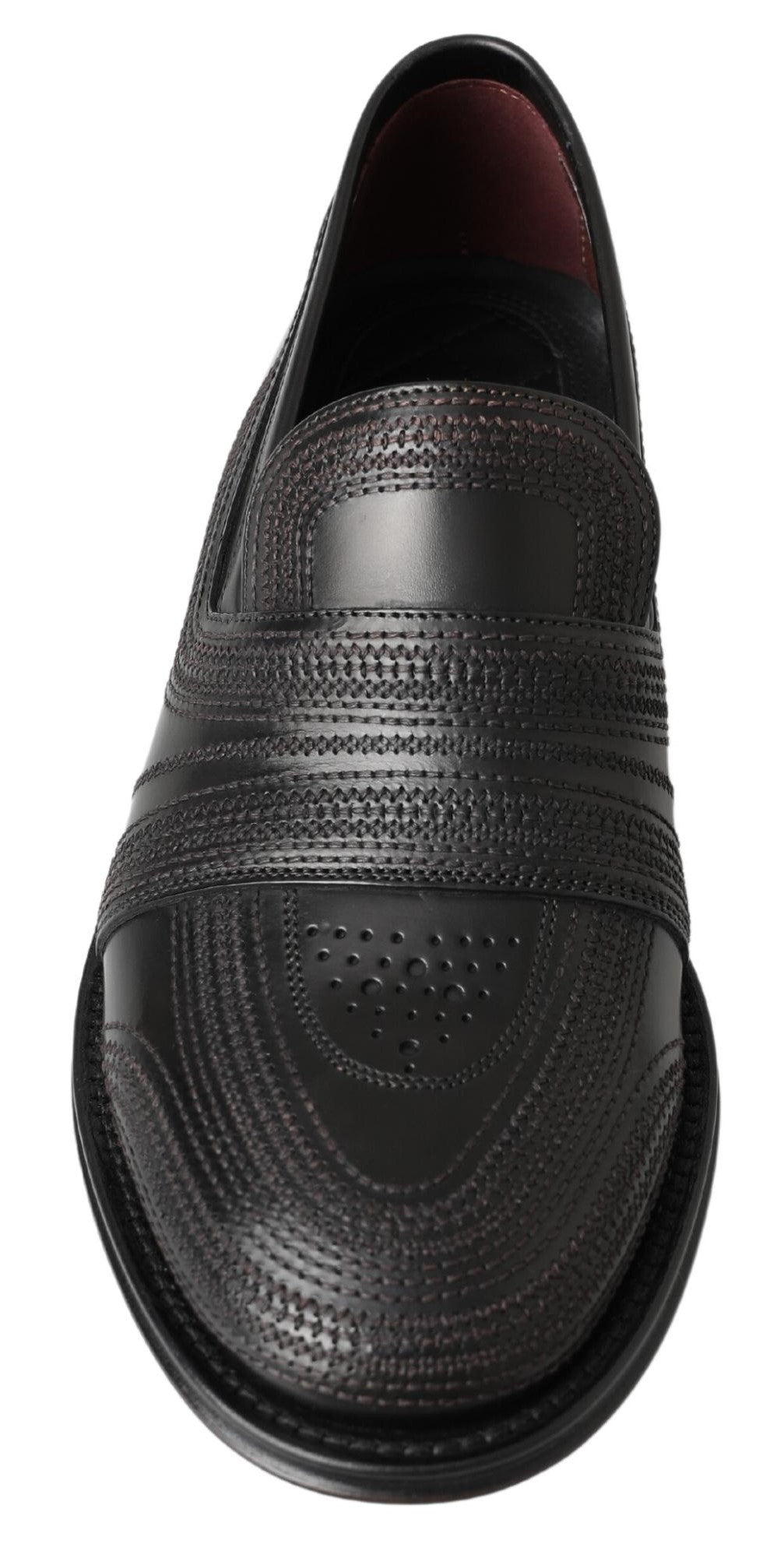 Schwarze Slipper aus Leder mit Ziernähten
