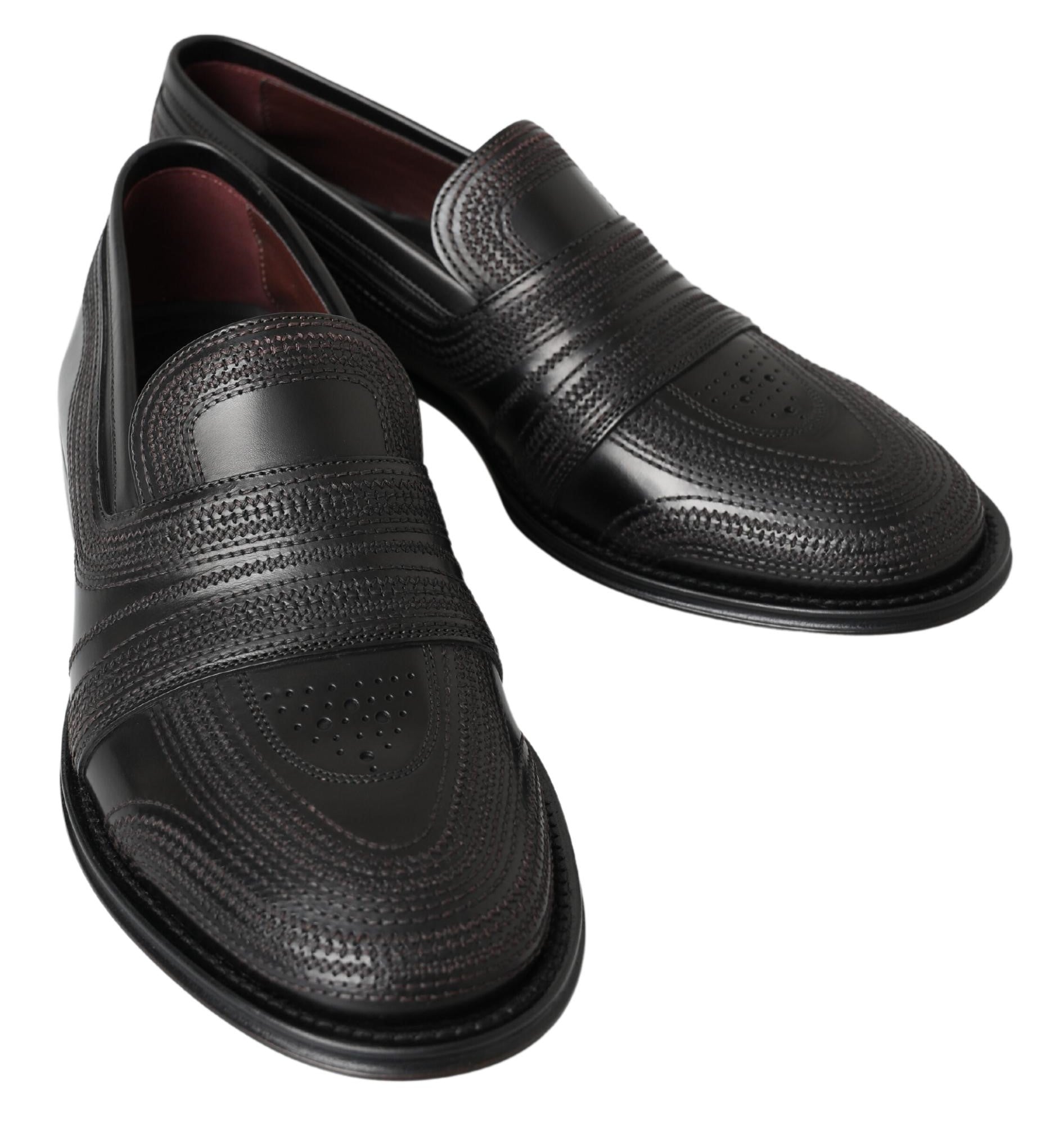 Schwarze Slipper aus Leder mit Ziernähten