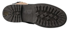 Stiefel aus schwarzem Leder mit braunem Shearling