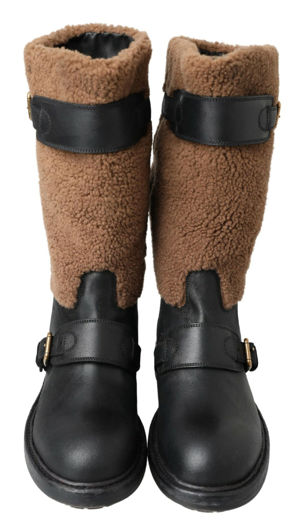 Stiefel aus schwarzem Leder mit braunem Shearling