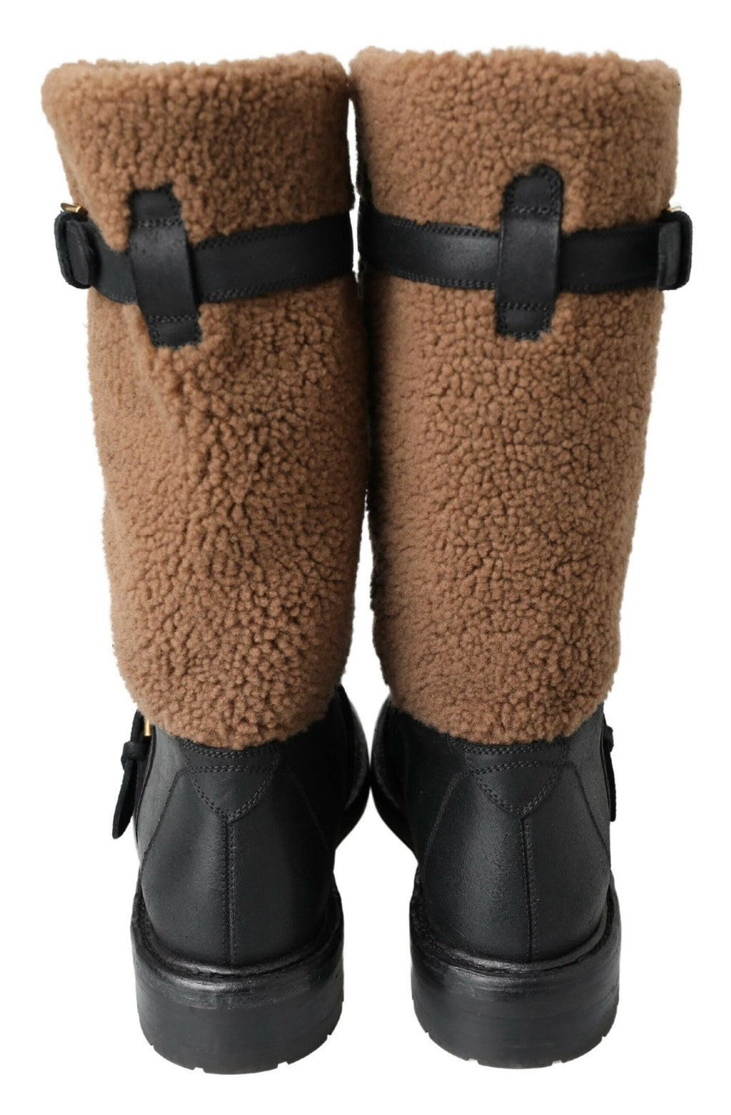 Stiefel aus schwarzem Leder mit braunem Shearling