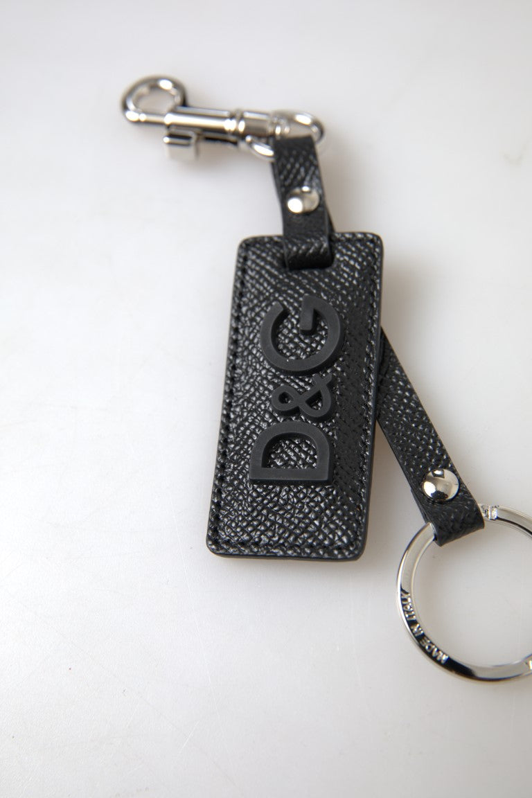 Schlüsselanhänger aus schwarzem Leder mit DG-Logo und silberfarbenem Metall