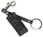 Schlüsselanhänger aus schwarzem Leder mit DG-Logo und silberfarbenem Metall