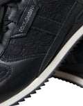 Schwarze Sneaker aus Leder mit floraler Spitze