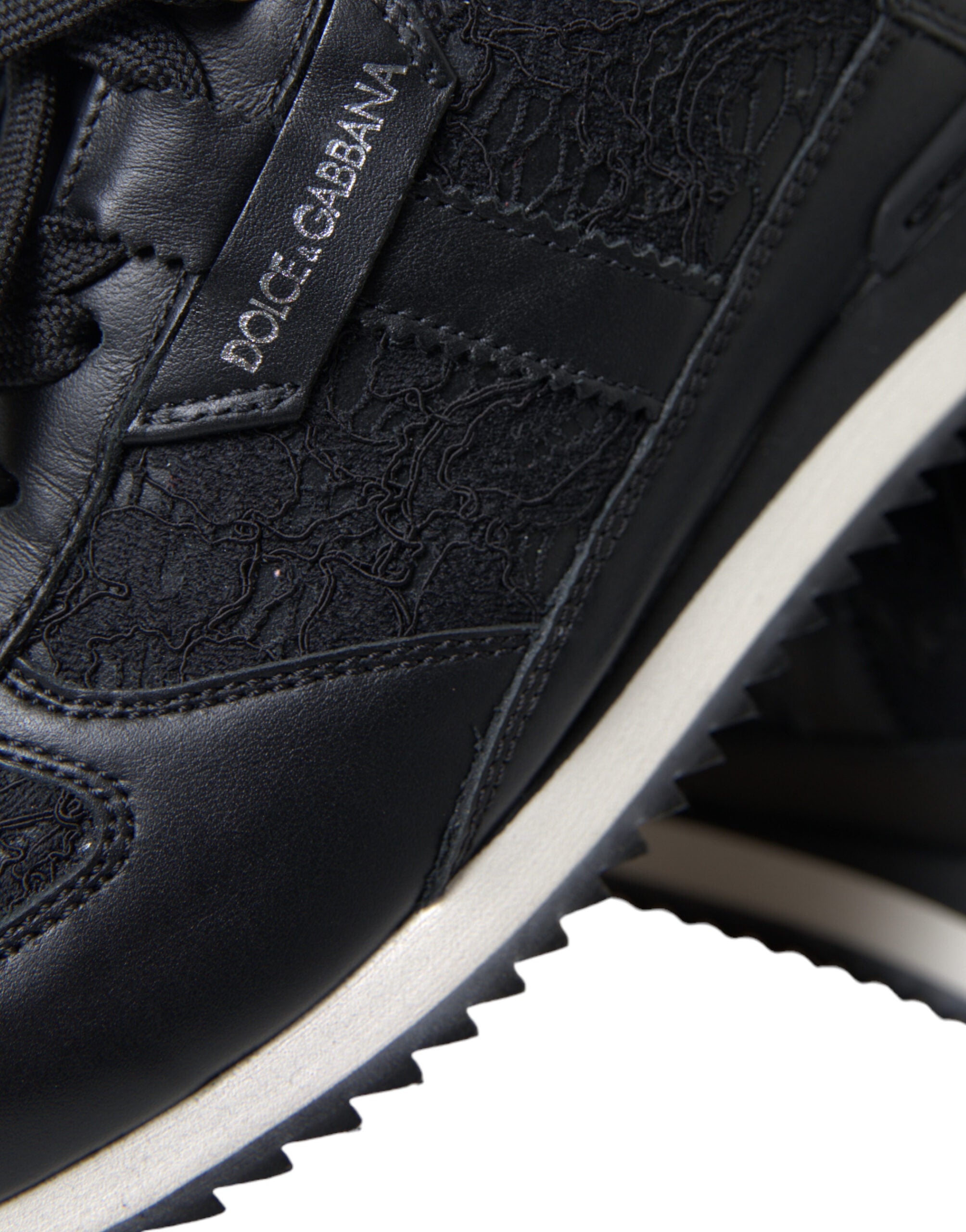 Schwarze Sneaker aus Leder mit floraler Spitze