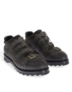 Graue Stiefeletten mit Knöchelriemen aus Leder