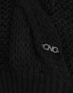 Schwarze ärmellose Strickweste
