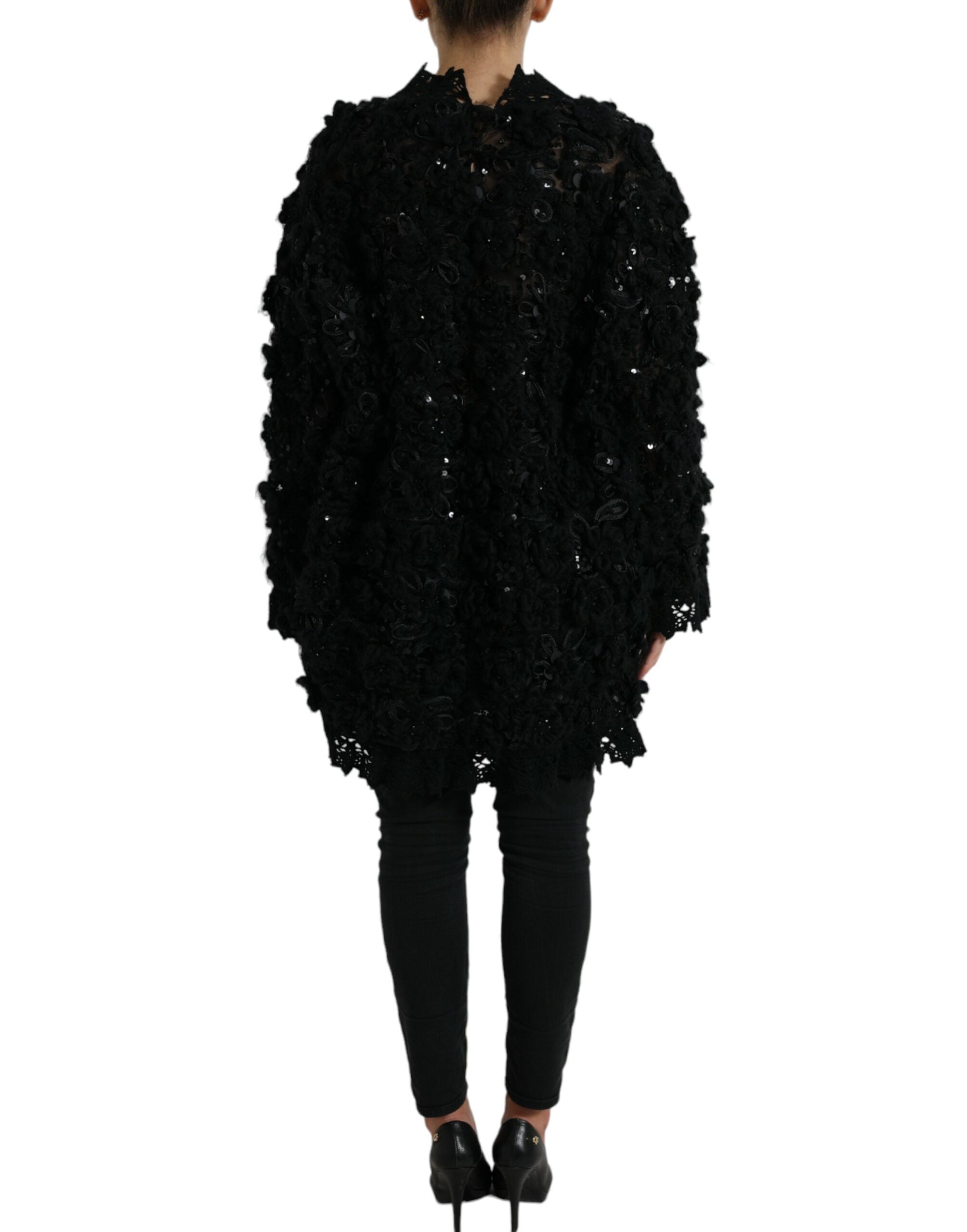 Schwarzer Pullover mit Paillettenbesatz