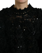 Schwarzer Pullover mit Paillettenbesatz