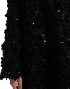Schwarzer Pullover mit Paillettenbesatz