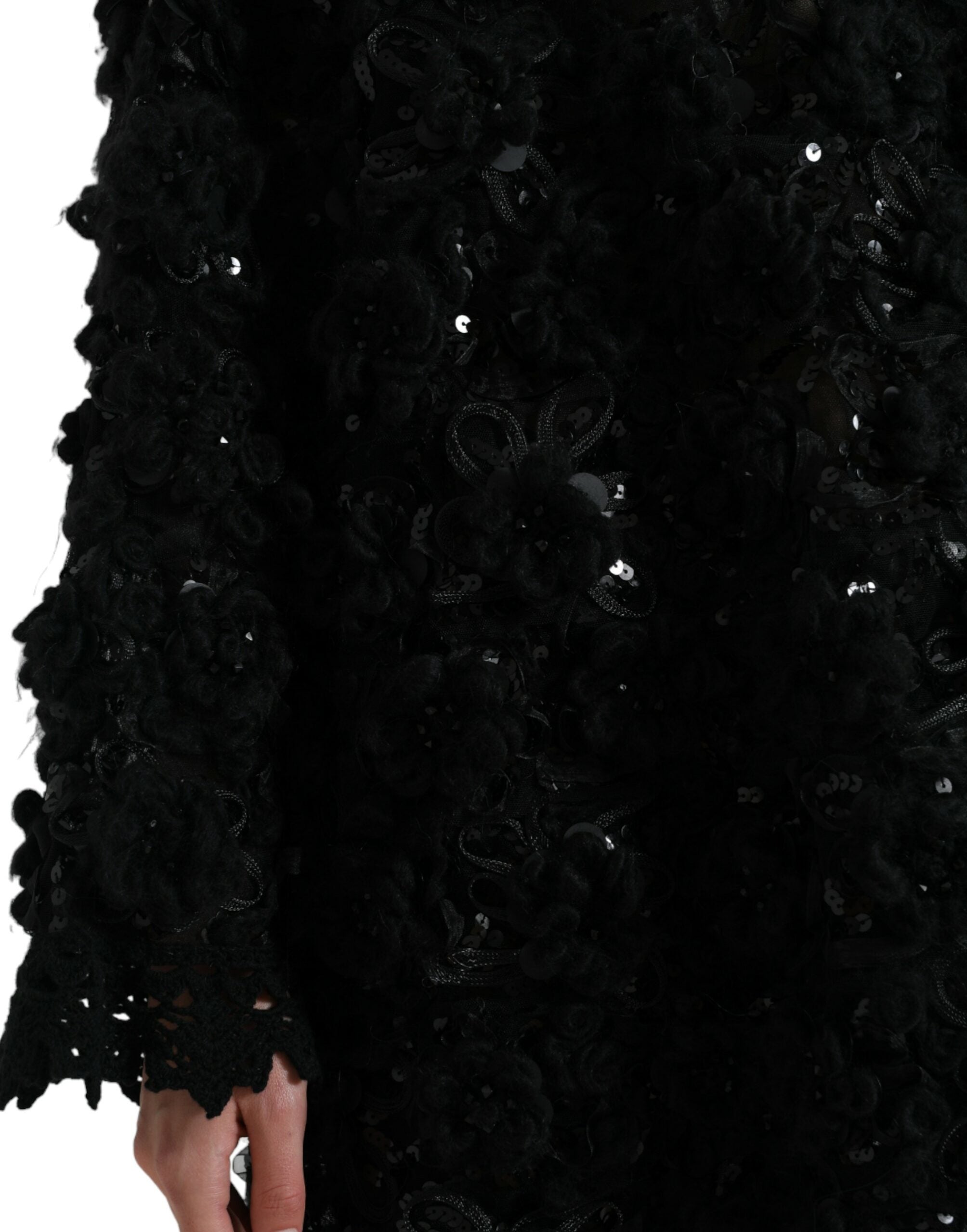 Schwarzer Pullover mit Paillettenbesatz