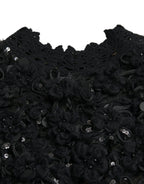 Schwarzer Pullover mit Paillettenbesatz