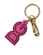 Pinker Schlüsselanhänger mit DG-Logo aus Gummi und goldfarbenem Metall