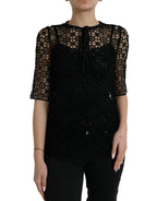Schwarze Spitzenbluse mit kurzen Ärmeln und Blumenmuster