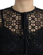 Schwarze Spitzenbluse mit kurzen Ärmeln und Blumenmuster