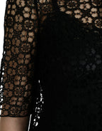 Schwarze Spitzenbluse mit kurzen Ärmeln und Blumenmuster