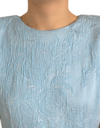 Hellblaues Mini-Kleid aus floralem Jacquard mit Puffärmeln